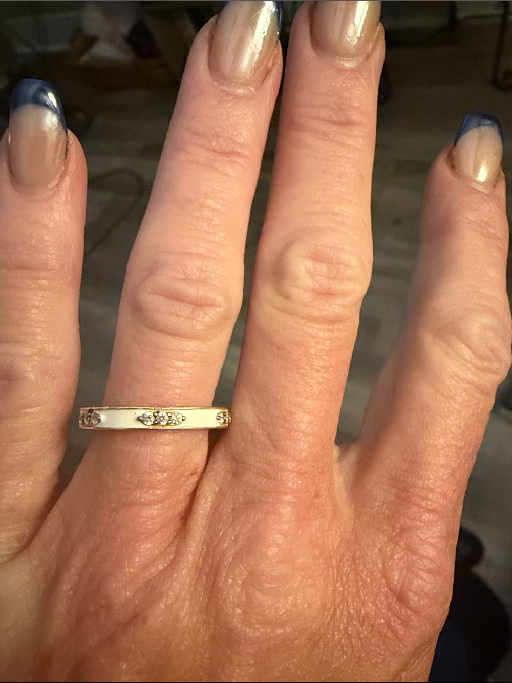 Gold-Tone Ring with White Inlay and Sparkling Accents